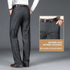 Close-up of anti-wrinkle polyester trousers showing crisp, crease-resistant fabric texture