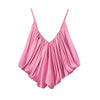 Statement satin top with elegant pleating and backless detail