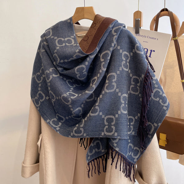 Timeless winter accessory: Winter Whisper cashmere shawl in a cozy, elegant design.