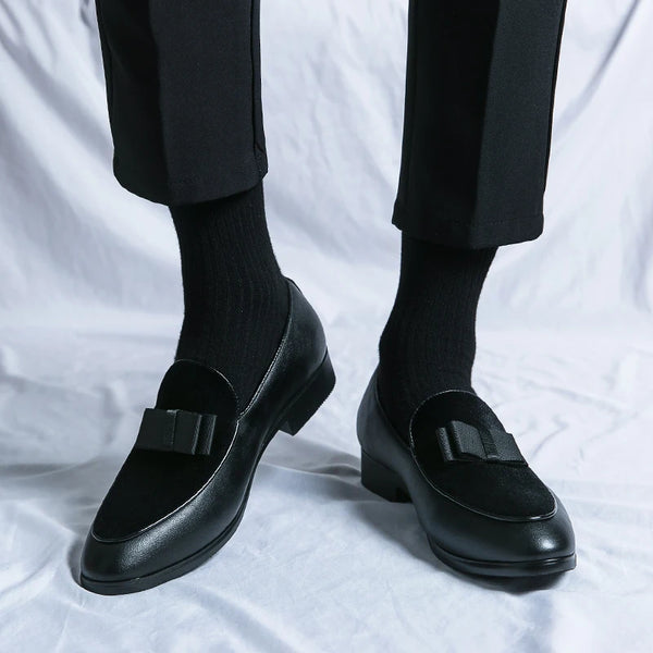Close-up of men's leather dress loafer showing premium construction and texture