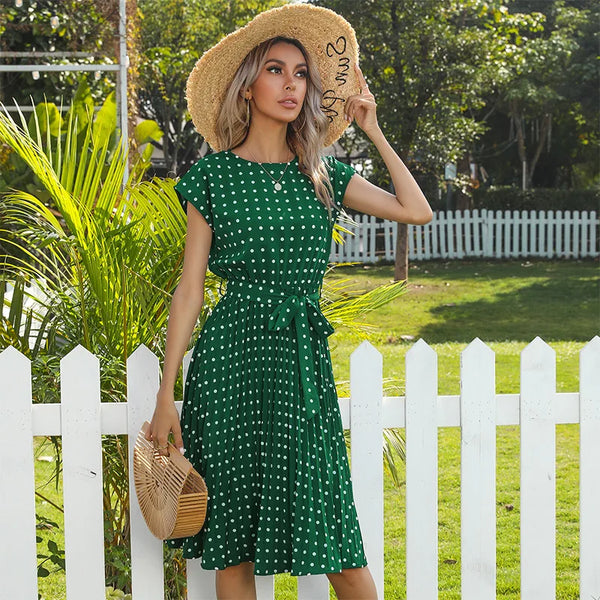 High waist polka dot dress with pleated skirt and knee length hem