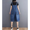 Vintage-inspired baggy denim jumpsuit with retro suspenders perfect for casual weekend outfits