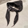 Soft and breathable scarf perfect for autumn wear.