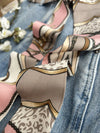 Chic fabric belt for women with geometric design, versatile for dresses, jeans, or as a scarf and headband accessory.