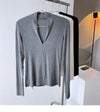 Elegant V-Neck Women's Blouse with Long Sleeves in solid color, perfect for casual and office wear, made from cotton-polyeste