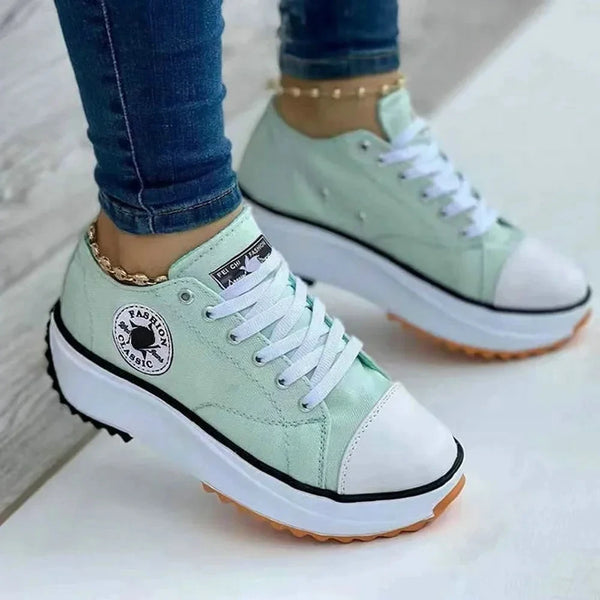 Stylish women's platform sneakers with mixed-color design and rubber outsole