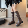 Chic women's knee-high boots with thick sole, stylish PU upper, rounded toe, perfect for winter elegance and comfort.