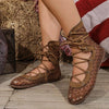Women's breathable mesh ankle boots featuring athletic-inspired lace-up design and flat heel
