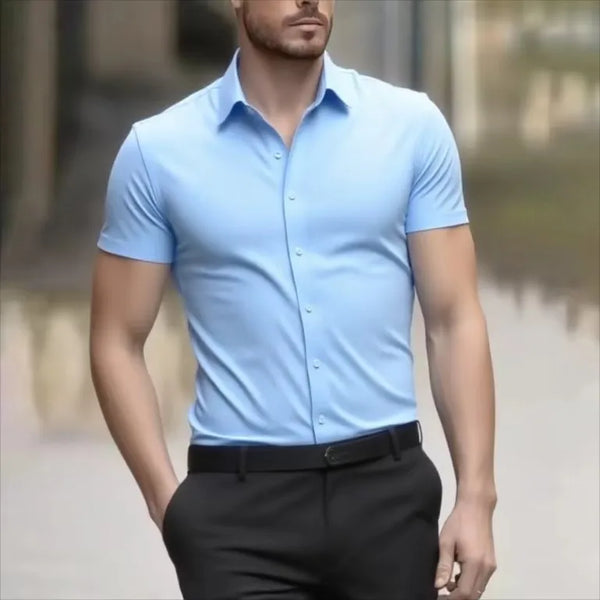 Man presenting in boardroom wearing comfortable short sleeve stretch business shirt