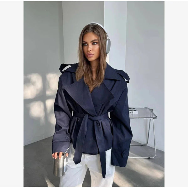 Double-breasted short trench featuring adjustable tie belt