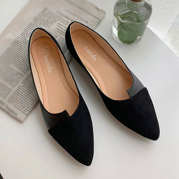 Pair of elegant knitted ballet flats with pointed toe on clean background