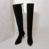 Sophisticated over-the-knee boots in soft suede with romantic lace-up detail and stiletto heels