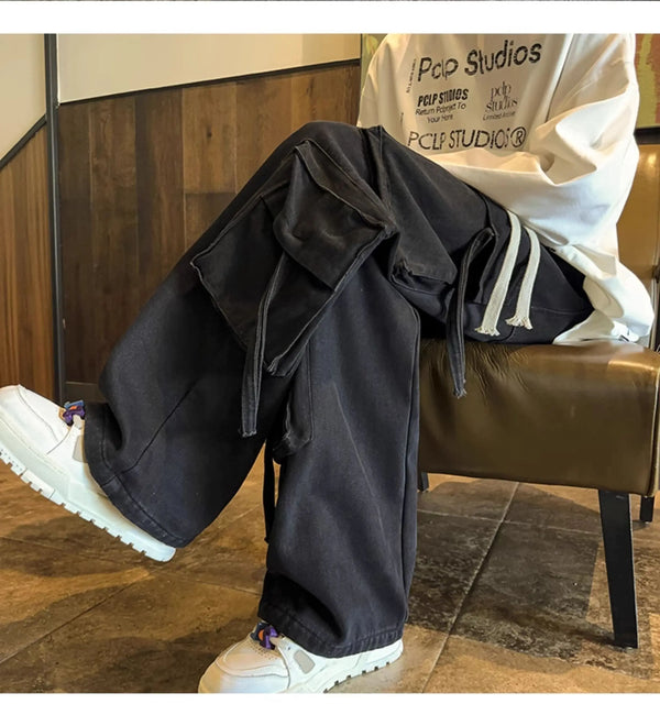 Men's urban clothing: wide-leg hip-hop jeans with drawstring.