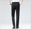 Navy stretch dress pants styled with blazer for polished boardroom appearance
