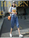 High-waist harem jeans with functional pockets and versatile calf-length design