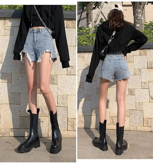 Distressed high rise shorts crafted from breathable cotton denim fabric