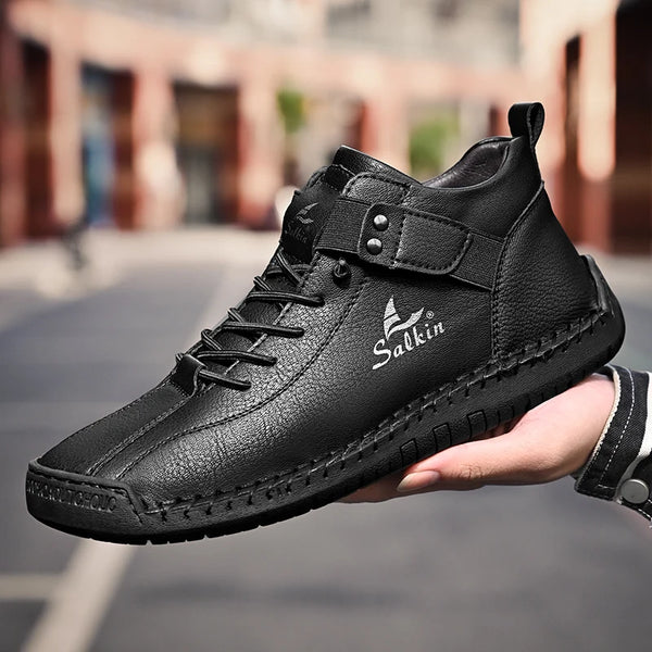 Handcrafted leather footwear with rugged outdoor-ready sole