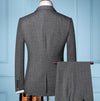 Model wearing the trio suit set, exuding a commanding presence.