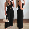 Woman wearing elegant deep V-neck jumpsuit in cotton-polyester blend fabric