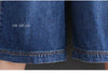 Wide leg denim jumpsuit with adjustable straps showing versatile styling options for all body types