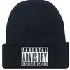 Lifestyle shot of Urban Pulse Knit Cap worn in a vibrant city setting.