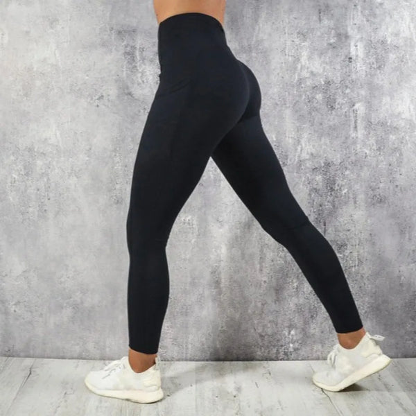Booty lifting leggings in teal, perfect for stylish workouts.