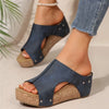 Sophisticated women's sandals with medium wedge and rubber traction sole