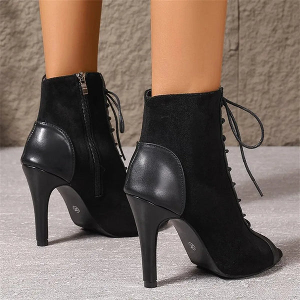 Modern lace-up boots featuring dramatic height and hollow-out fashion elements