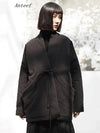 Oversized beige cotton padded jacket with belt and deep pockets displayed on white background