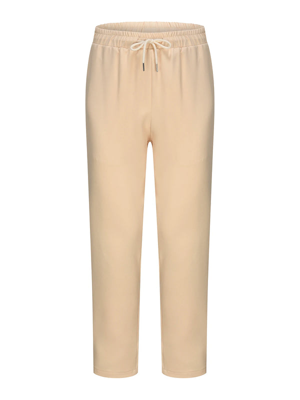 African heritage two-piece set displayed flat showing complete shirt and pants coordination