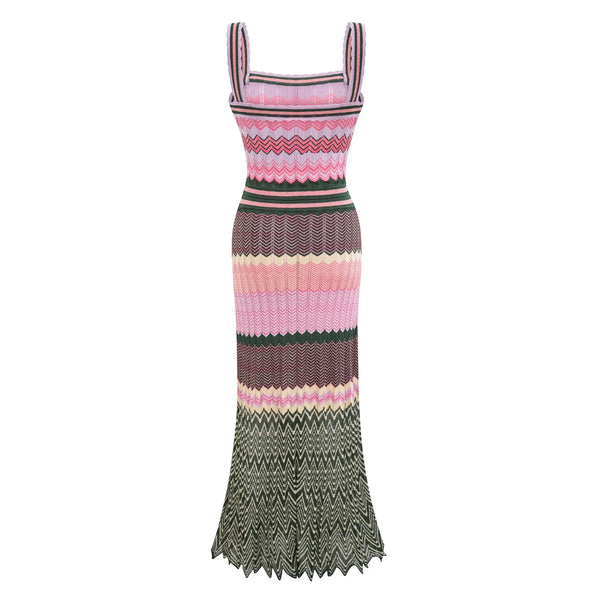 Detail shot of the viscose fabric of the zigzag maxi dress, highlighting its luxurious feel.