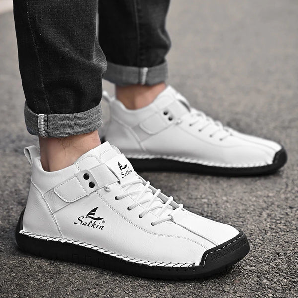 Handmade ankle boots featuring waterproof treated leather