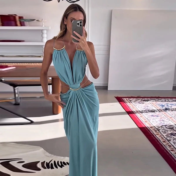 Summer gala dress with halter neckline, open back, and flattering waist cutouts