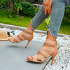 Sophisticated lavender stiletto sandals with durable rubber outsole.