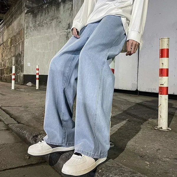 Men's casual denim pants featuring modern wide-leg design and elastic waist