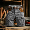 Street-style cargo shorts showcasing contrast patchwork detail and functional pockets