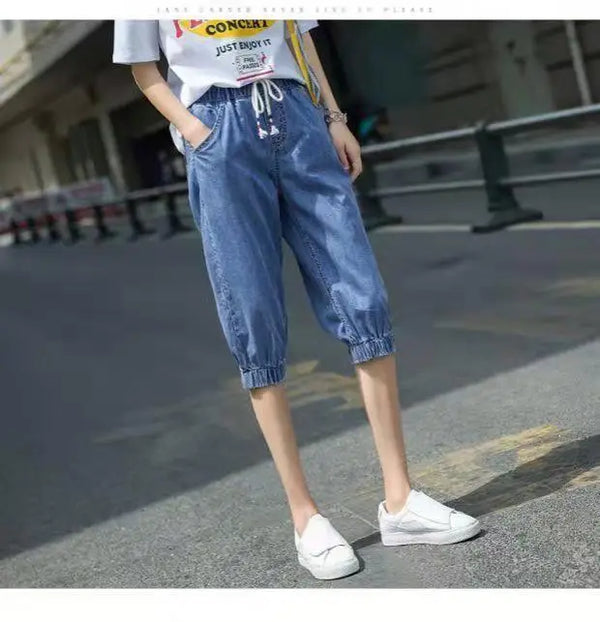 High-waist harem jeans with loose silhouette and versatile spring summer design