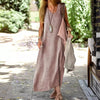 Woman wearing breathable cotton linen maxi dress with flattering V-neckline