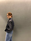 Chic cropped leather jacket for women in premium faux leather, perfect for autumn and winter streetwear fashion.