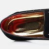 Elegant suede loafers for men with subtle animal print detail, adding sophistication.