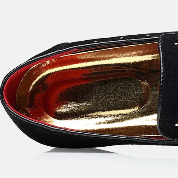 Elegant suede loafers for men with subtle animal print detail, adding sophistication.