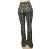 Bohemian flare leg pants for women with vibrant floral print, perfect for casual or festival wear in spring and summer.