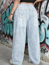 Retro style denim jeans in light wash, perfect for winter outfits.