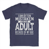 Men's humorous "Mistaken For An Adult" cotton tee with playful print, perfect for casual outings and everyday wear.