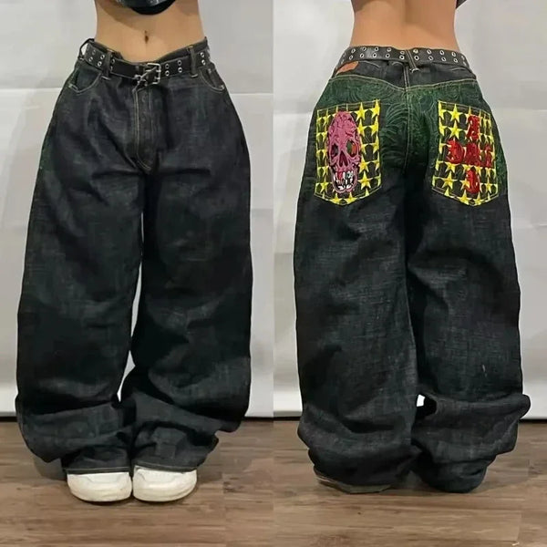Blue wide-leg jeans featuring bold designs for a unique style.