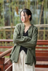 Single-breasted cotton linen coat with elegant stand collar and regular length