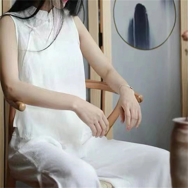 Modern kimono-style linen top with cultural elegance.
