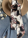 Chic fabric belt for women with geometric design, versatile for dresses, jeans, or as a stylish scarf or headband.