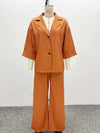 Back view of the Chic Command Set, highlighting the tailored fit of the shirt and pants.