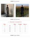 Men's long double-breasted trench coat in solid color with turn-down collar, perfect for autumn and winter streetwear.
